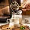 1pc Double Spout Measuring Cup With Wooden Handle; Household Glass Measuring Cup; Kitchen Supplies - 100ml